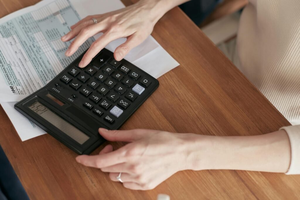 Illustration of digital contract, credit card, and coins – representing financial processes for PAN Card for NRIs – Complete Guide (2025)