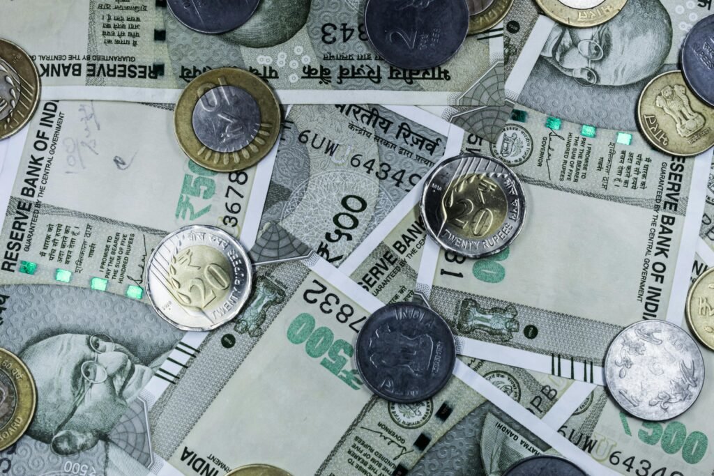 Indian currency notes symbolizing foreign exchange — What is FEMA (Foreign Exchange Management Act) and how it regulates money flow for NRIs.