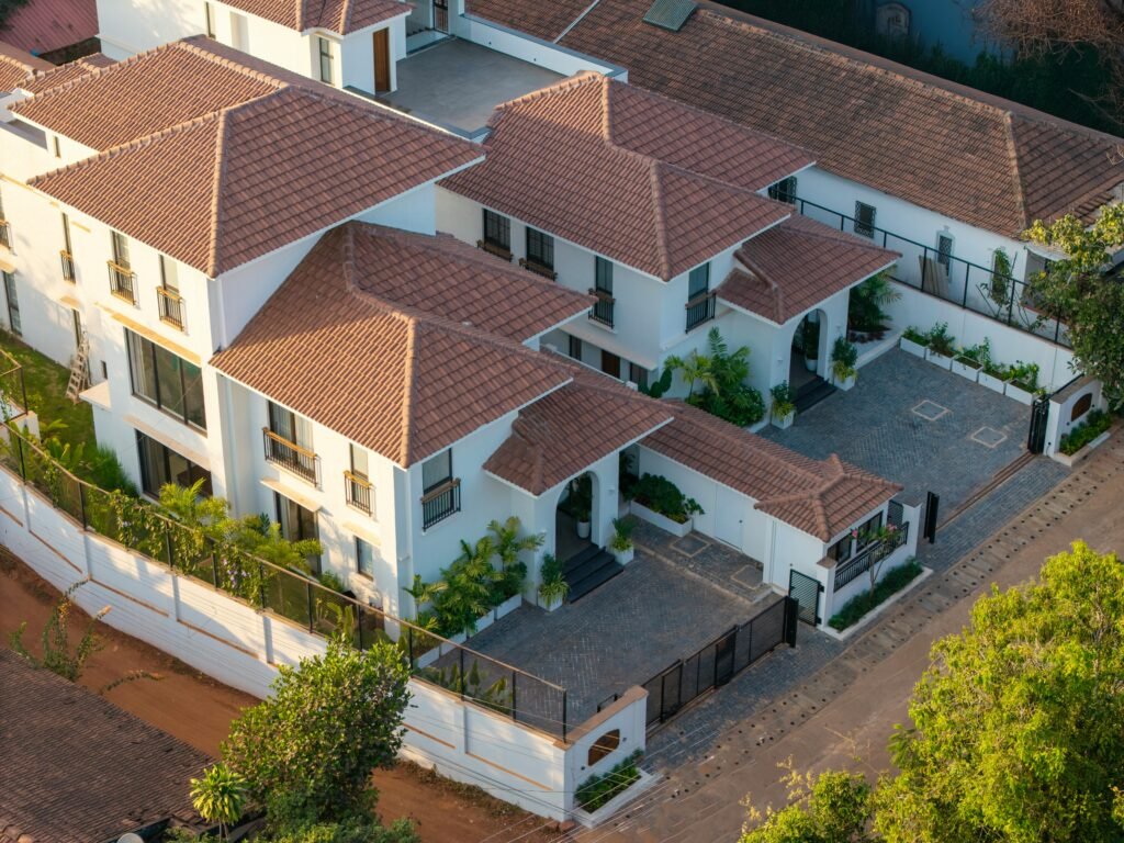 NRIs Real Estate Investment Guide (2025) – Complete guide for NRIs to buy, sell, and manage property in India with tax and legal tips.