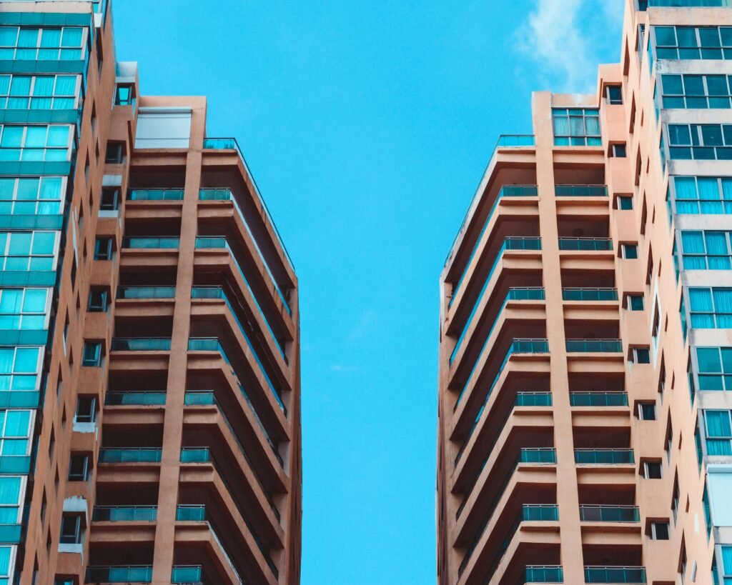 Residential building in India – Benami Property Complete Guide for NRIs (2025) explaining risks, rules, and safe investment options.