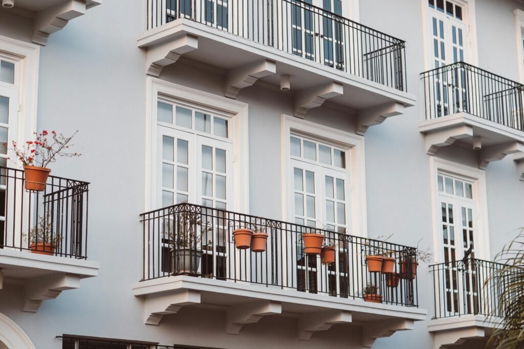 Flats in India illustrating What is Property Registration in India? — Step-by-Step for NRIs, covering documents, fees, and legal process.