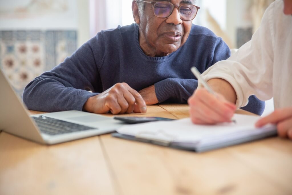 Senior man reviewing paperwork for retirement planning