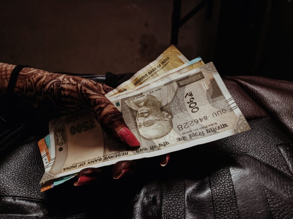 Indian rupee notes representing savings under NRI PPF account rules